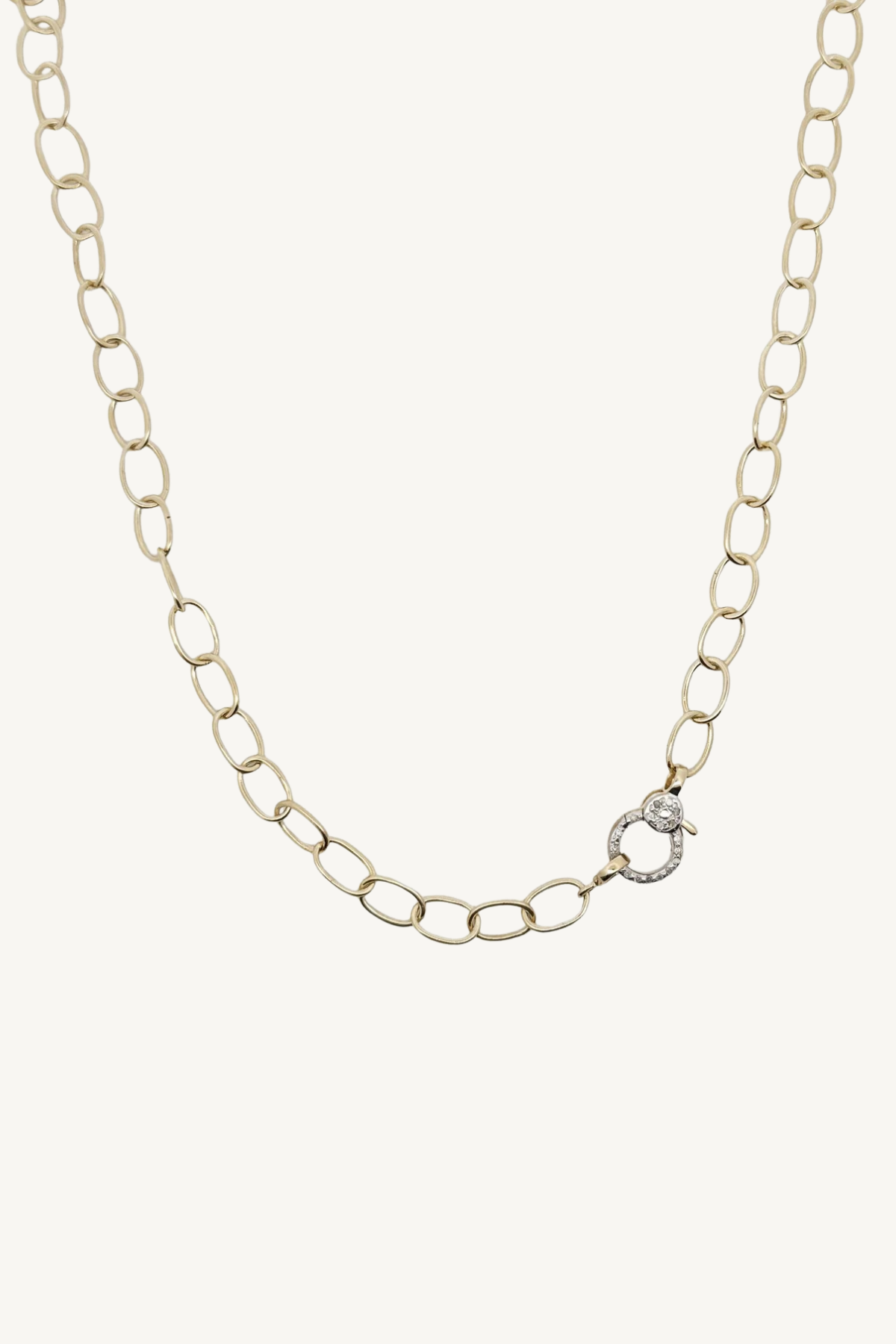 small oval link chain with pave diamond round clasp