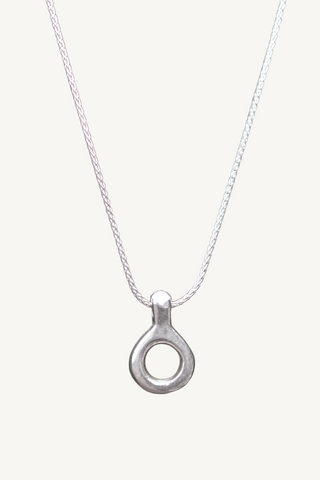 Liz Hanson Metalsmith original design. Hand carved sterling silver necklace charm pendant suspended on a wheat chain.