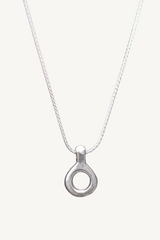 Liz Hanson Metalsmith original design. Hand carved sterling silver necklace charm pendant suspended on a wheat chain.