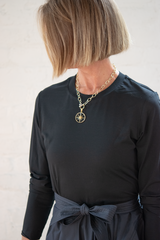 black enamel sunburst pendant