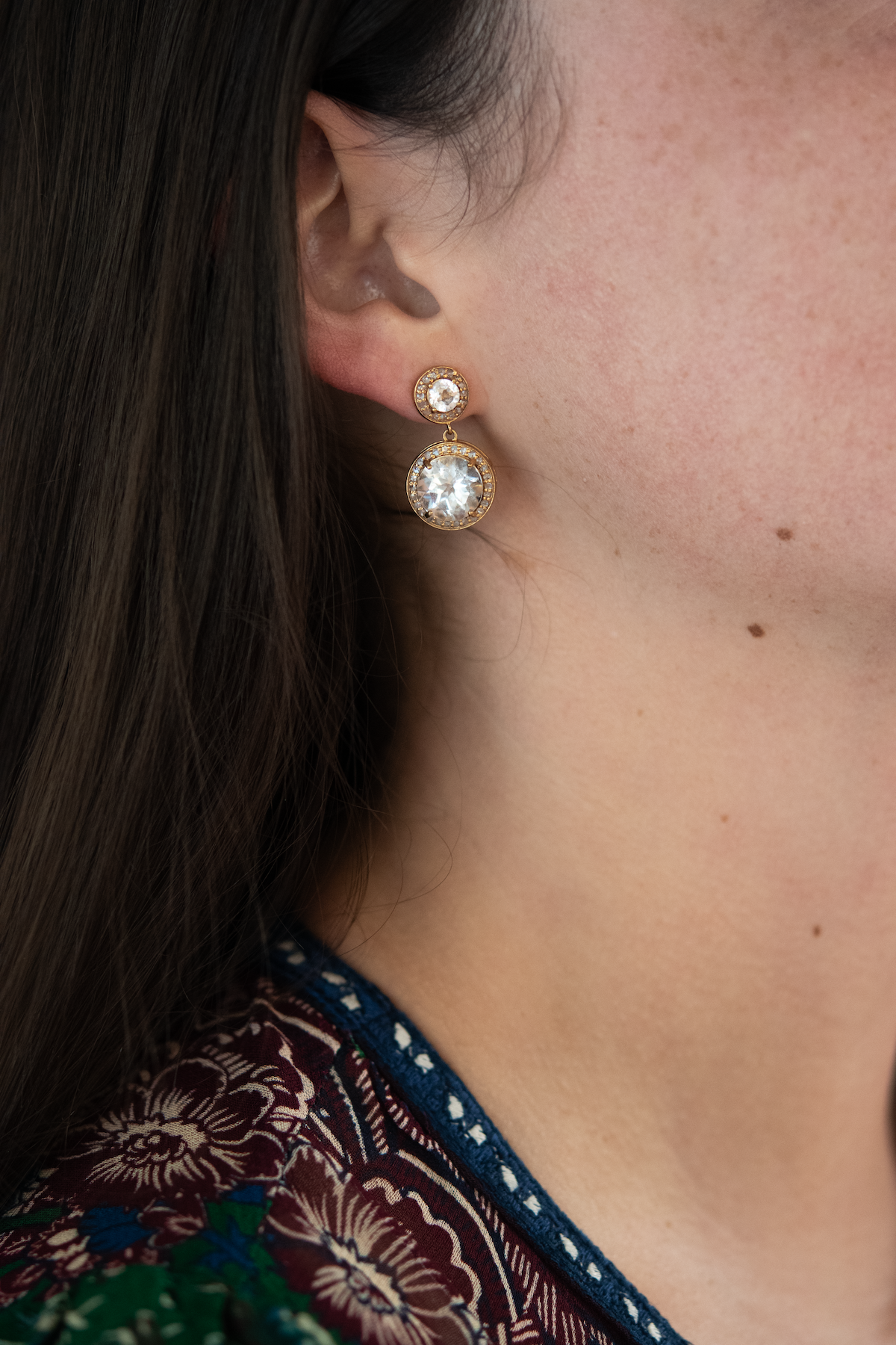 white topaz drop earrings - large brass