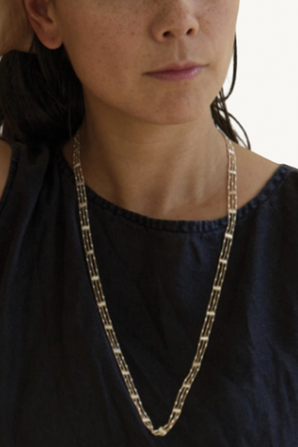 dice necklace - brass and silver