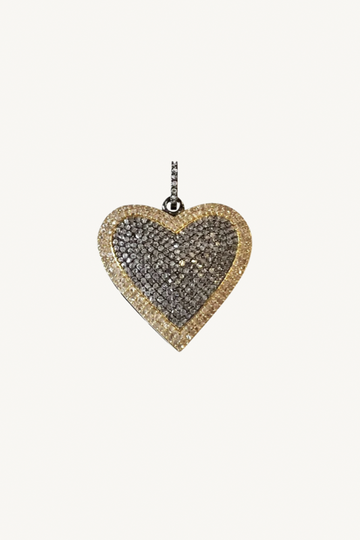 silver and gold heart pendant