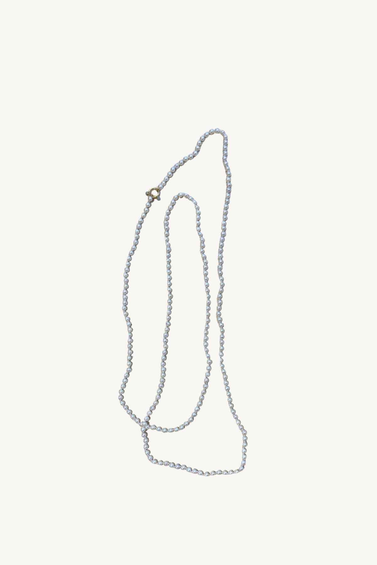 long pearl strand with toggle closure